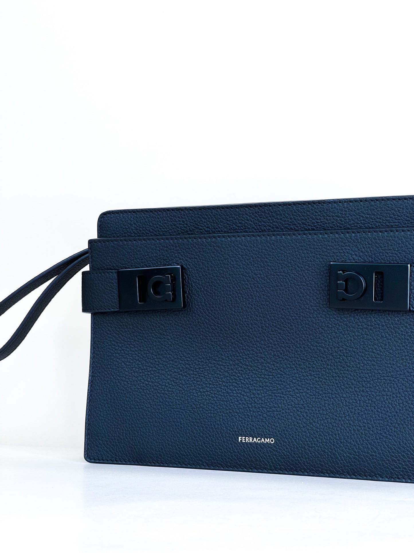 Ferragamo Pouch With Gancini Buckles Hammered Calfskin Black