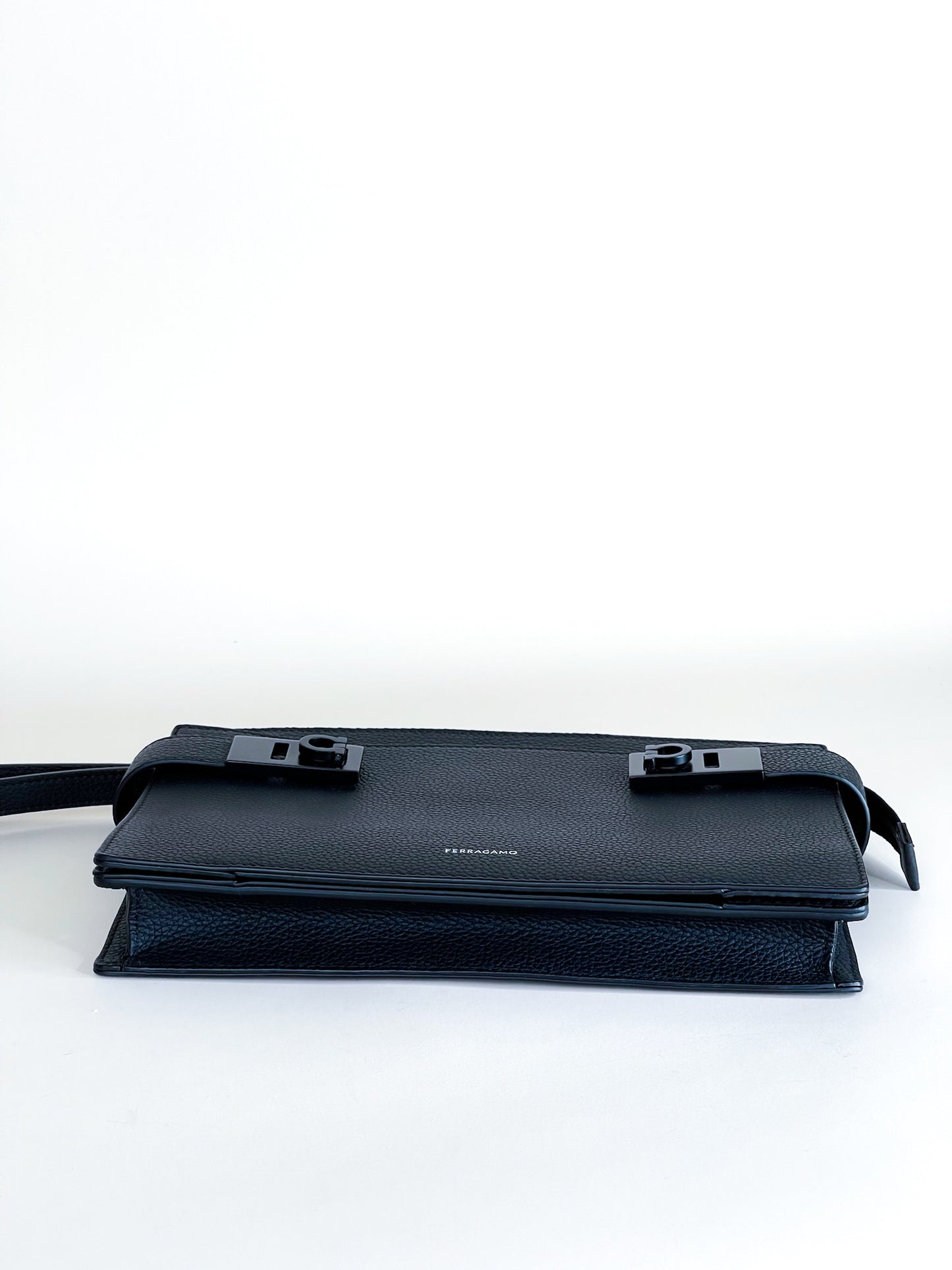 Ferragamo Pouch With Gancini Buckles Hammered Calfskin Black