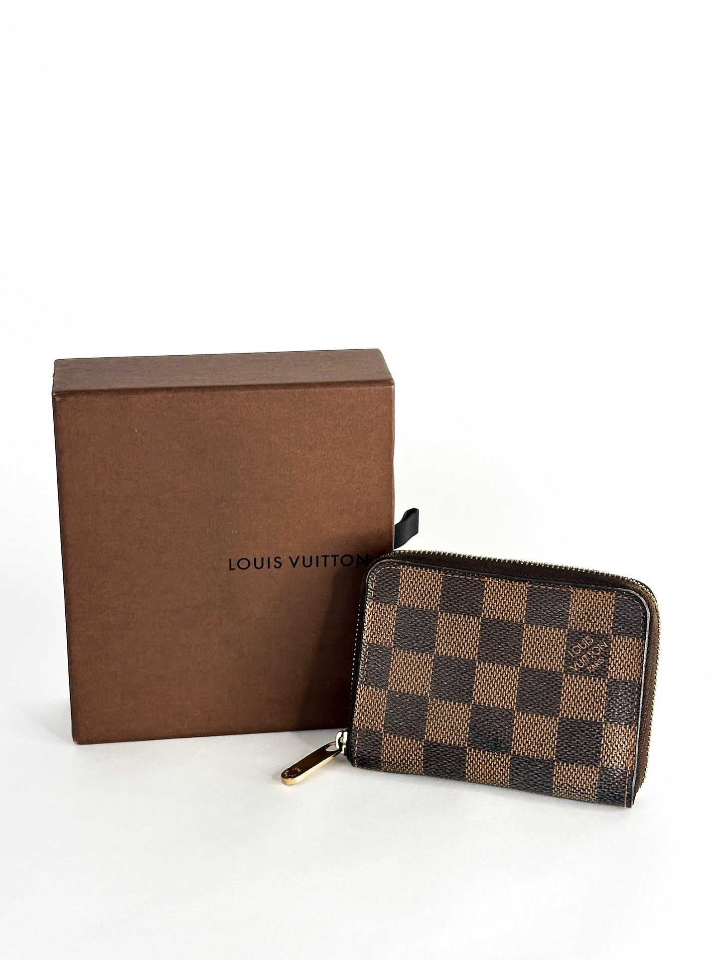 Louis Vuitton Damier Ebene Canvas
Zippy Coin Purse