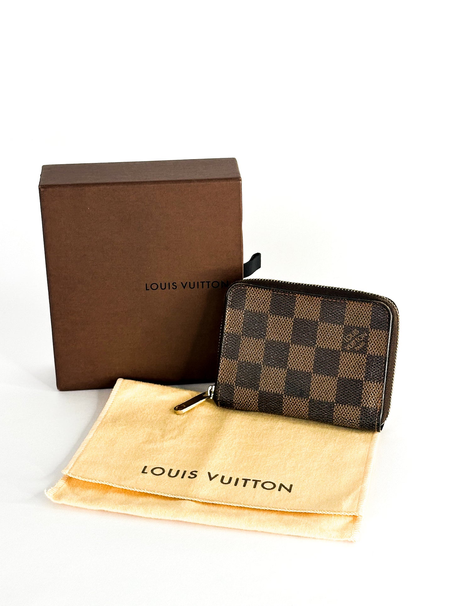 Louis Vuitton Damier Ebene Canvas
Zippy Coin Purse